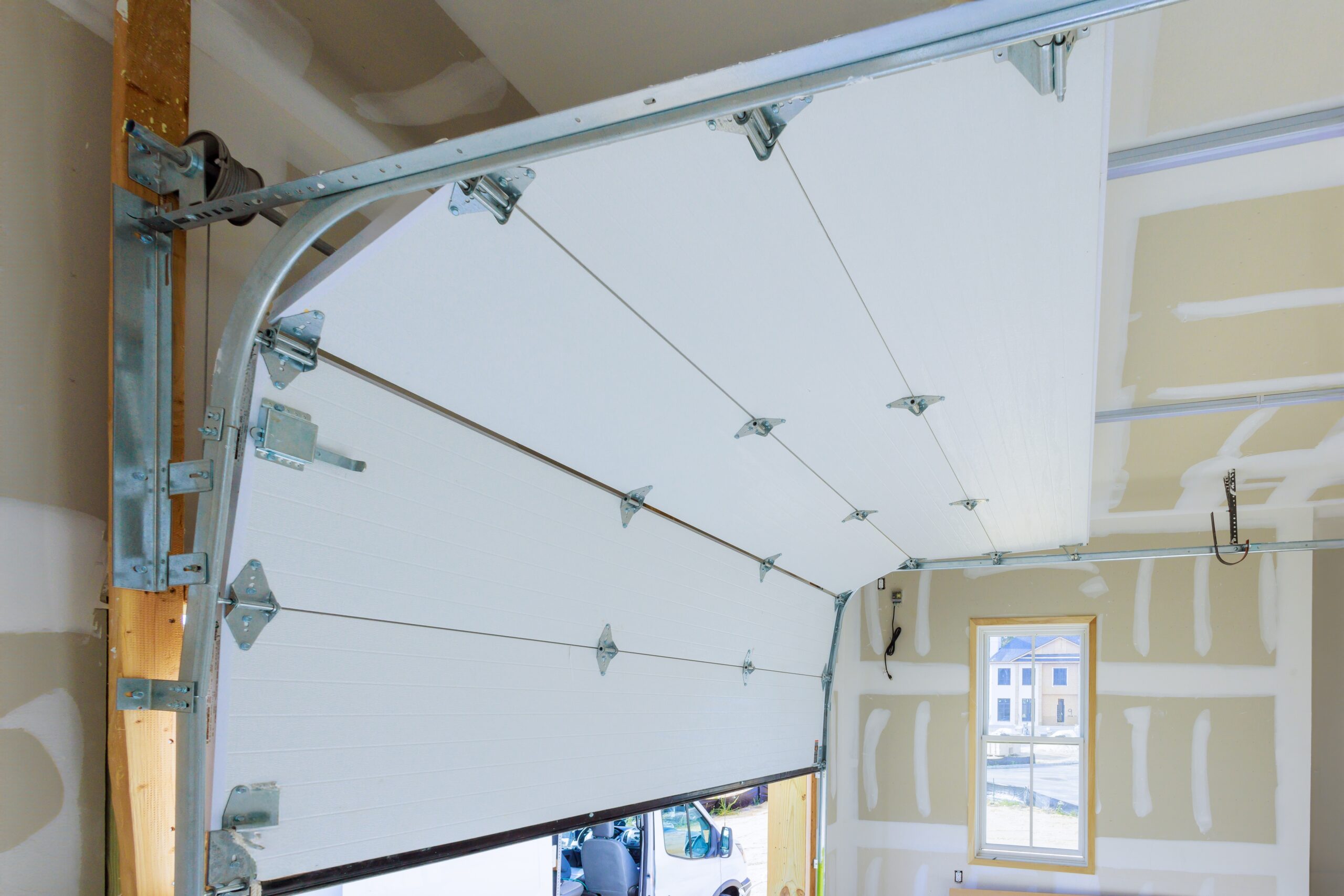 photo from inside a garage after the height of the garage door has been adjusted