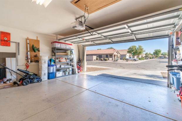 garage door opener repair needing to be done on a residential garage door